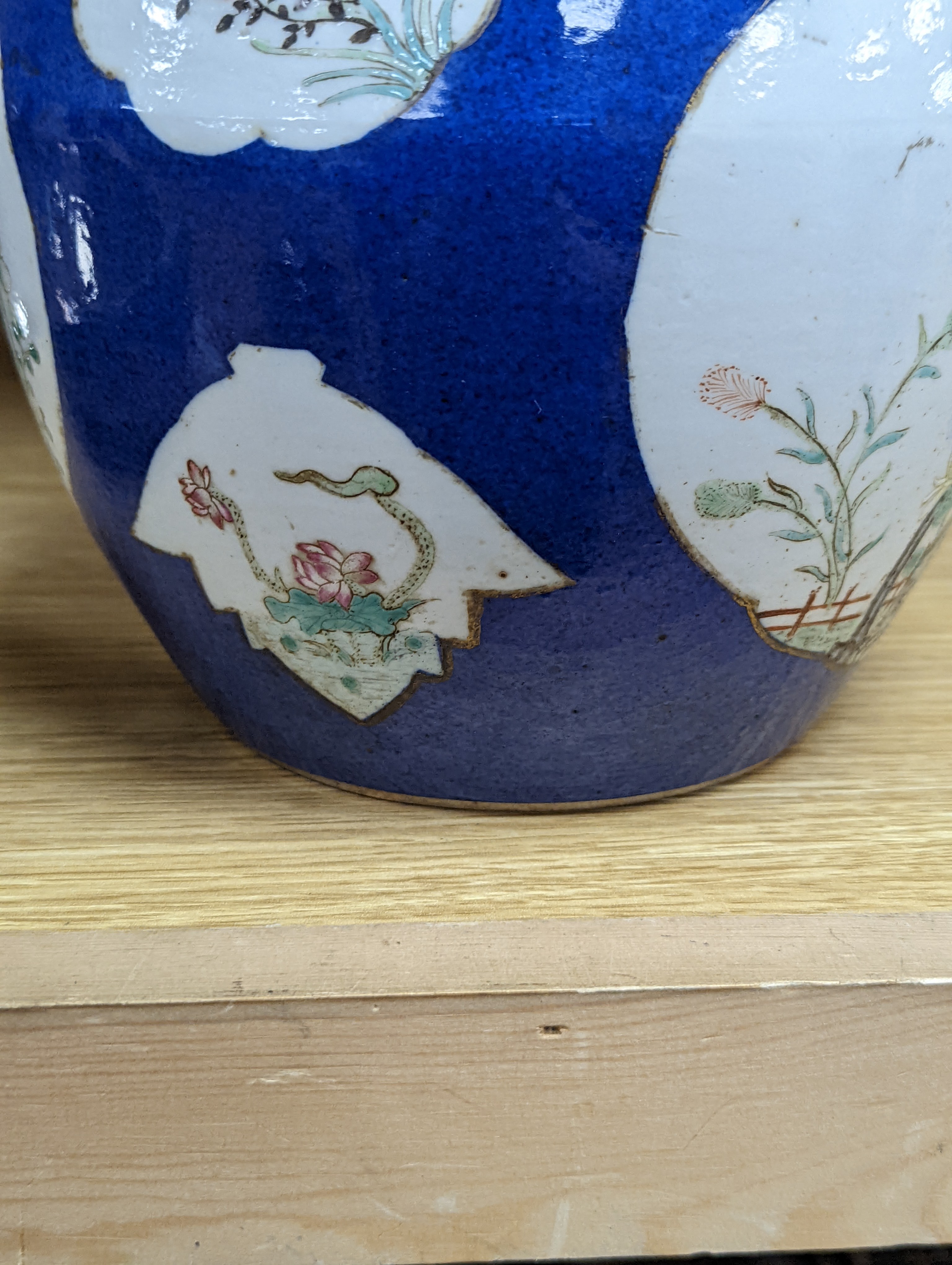 A Chinese blue ground jar and cover, 19th century, Qianlong mark to base, 20cm high